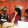 Africa's regional program managers, Lamech Katamba and Huguette Diakabana, plan with  International Program Manager Lonnie Best-Jarvis in ABF's Sacramento office.
